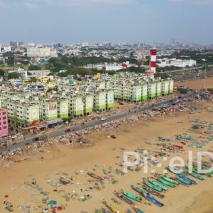 PD0833 - Aerial Flight Over Chennai Cityscape Towards Marina Beach
