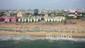 PD0832 - Aerial Pan of Chennai's Vibrant Fishing Beach