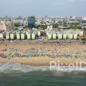 PD0832 - Aerial Pan of Chennai's Vibrant Fishing Beach