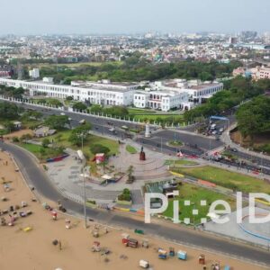 PD0828 - Aerial Pan of Chennai's Kamarajar Promenade and Marina Beach