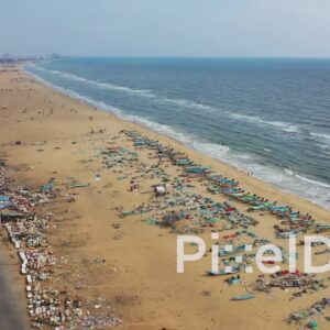 PD0823 - Aerial Pan of a Bustling Fishing Beach in Chennai