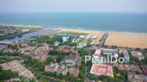 PD0864 - Aerial Flight Over Chennai's Cityscape Towards Marina Beach
