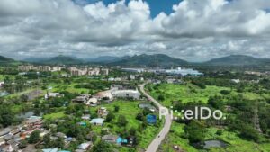 PD0760 - Aerial View of a Developing Valley with Rural and Industrial Areas