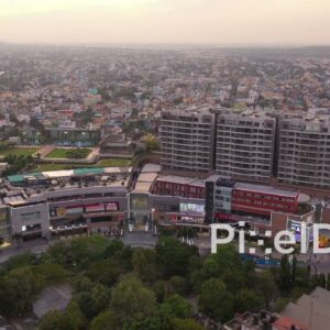 PD0892 - Cinematic Aerial View of a Modern Urban Complex at Dusk