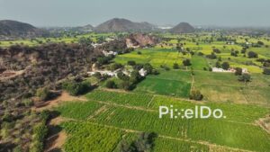 PD0780 - Scenic Aerial Flight Over a Rural Valley in Rajasthan