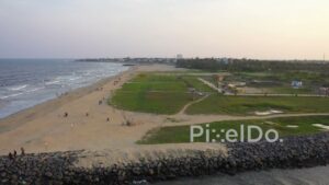 PD0895 - Cinematic Aerial View of Chennai's Kovalam Beach at Sunset
