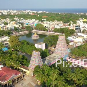 PD0884 - Aerial Orbit of a Colorful Coastal Temple Complex