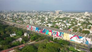 PD0879 - Aerial Pan of Vibrant Street Art on a Building in Chennai