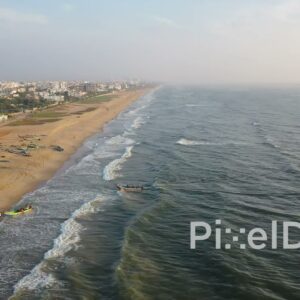 PD0933 - Drone Follows Fisherman Returning to Shore with the Day's Catch
