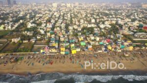 PD0929 - Aerial Pullback Reveal of a Colorful Coastal Fishing Village