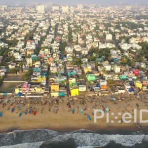 PD0929 - Aerial Pullback Reveal of a Colorful Coastal Fishing Village