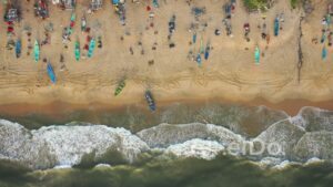 PD0926 - Top-Down Aerial View of a Vibrant Fishing Beach