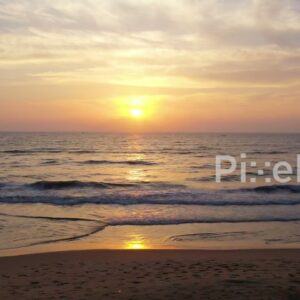 PD0923 - Scenic Aerial Pan of a Beach at Sunrise