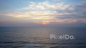 PD0917 - Serene Aerial View of the Ocean at Twilight