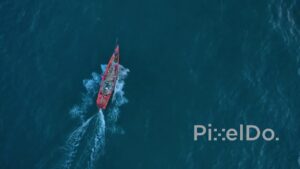 PD0912 - Cinematic Aerial of a Fishing Boat at Sunrise