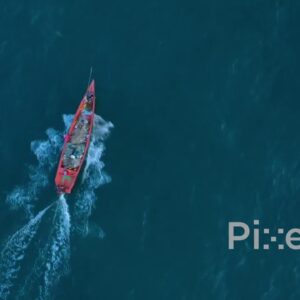 PD0912 - Cinematic Aerial of a Fishing Boat at Sunrise