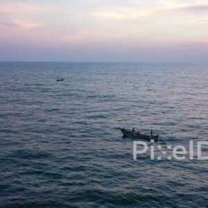 PD0910 - Aerial View of a Fishing Boat at Twilight