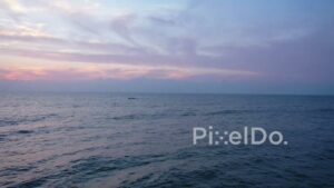 PD0909 - Aerial Flight Towards a Fishing Boat at Sunrise