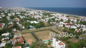 PD0949 - Drone Pan Over a Sprawling Seaside Residential Community