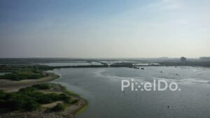 PD0963 - Aerial Drone Flight Over a Sprawling Urban Wetland