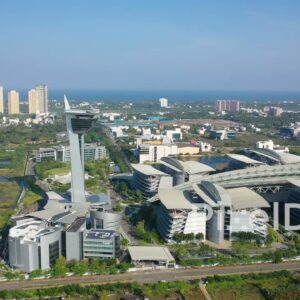 PD0956 - Orbiting Drone Shot of Modern Technology Park and Coastal Cityscape