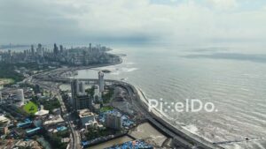 PD0989 - High-Angle Aerial View of a Coastal Metropolis and its Expansive Highway System