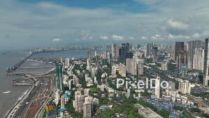 PD0992 - Dynamic Aerial Pan of the Worli Skyline, Sea Link Bridge, and Coastal Highway