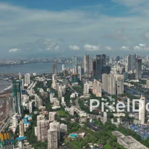 PD0992 - Dynamic Aerial Pan of the Worli Skyline, Sea Link Bridge, and Coastal Highway