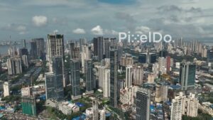 PD0986 - Aerial Pan of Mumbai's Worli Skyscraper Skyline