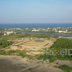 PD0976 - Aerial Pan of Coastal Real Estate Development and Estuary
