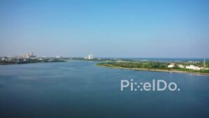 PD0964 - Scenic Drone Pan Over Muttukadu Backwaters with City and Ocean Views