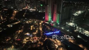 PD0773 - Vibrant Nighttime Aerial of an Illuminated Township in Thane