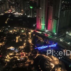 PD0773 - Vibrant Nighttime Aerial of an Illuminated Township in Thane
