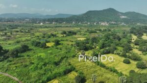 PD1030 - Aerial Flight Over Lush Green Rural Valley