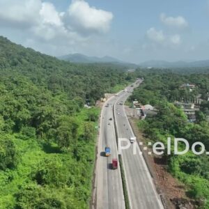 PD1037 - Aerial Drone Flight Over Scenic Highway Through Mountain Valley