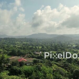PD1031 - Scenic Aerial Flight Over Lush Green Valley and Mountains