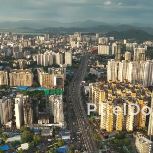 PD1105 - Aerial Drone Flight Over Dense Urban Cityscape with Highway and Metro