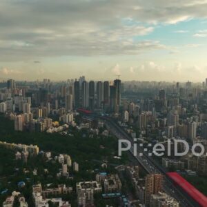 PD1100 - Dramatic Aerial Drone Pan of Mumbai's Western Suburb with Metro Line 7