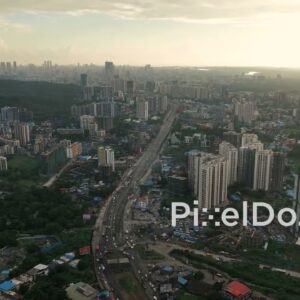 PD1093 - Aerial Drone Pan of Western Express Highway in Mumbai's Mira Road Area
