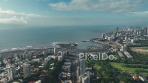 PD1148 - Aerial Drone Tilt-Up of Mumbai's Coastal Skyline and Mahalaxmi Racecourse