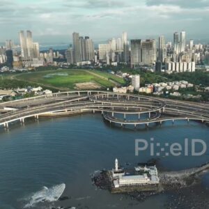 PD1129 - Aerial Drone Pan of Haji Ali Dargah, Coastal Road, and Mumbai Skyline