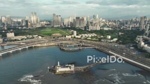 PD1128 - Aerial Drone Pan of Haji Ali Dargah, Coastal Road, and Mumbai Skyline