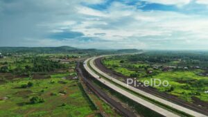 PD1180 - Aerial Drone Rise Over Scenic Expressway and Rural Landscape