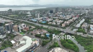 PD1174 - Aerial Drone Flight Over Vashi Cityscape, Railway, and Highway