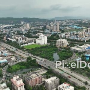 PD1169 - Aerial Drone Pan of Vashi Cityscape with Sion Panvel Highway and Inorbit Mall