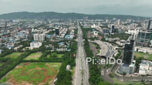 PD1168 - Aerial Drone Flight Over Vashi Flyover, Cidco Exhibition Centre, and Cityscape
