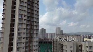 PD1152 - Aerial Drone Rise Over Modern High-Rise Construction Site