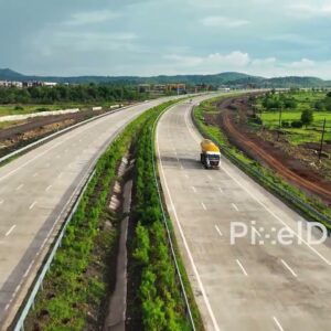 PD1192 - Dynamic Drone Flight Over Scenic Expressway in Mountain Valley