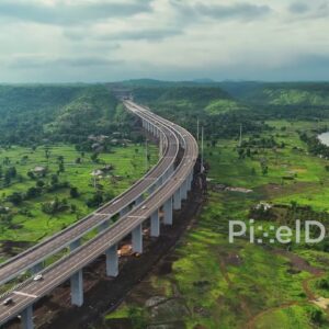 PD1184 - Aerial Drone View of Heavy Machinery at a Large-Scale Construction Site