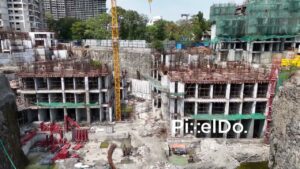 PD1005 - High-Angle View of Urban High-Rise Construction Site
